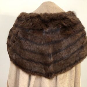 Vintage rabbit stole
Brown with darker brown horizontal lines
Round closure